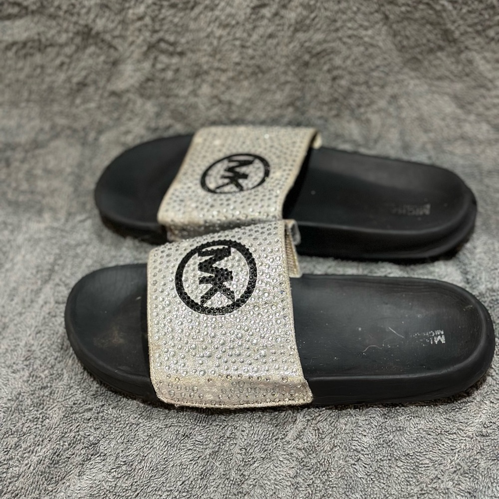 Girls Slides. Good condition. Will clean by request with purchase. Size 3